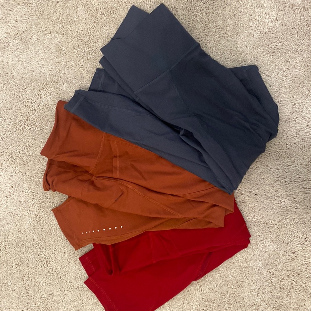 Three pairs of petite women’s leggings.  Size medium.